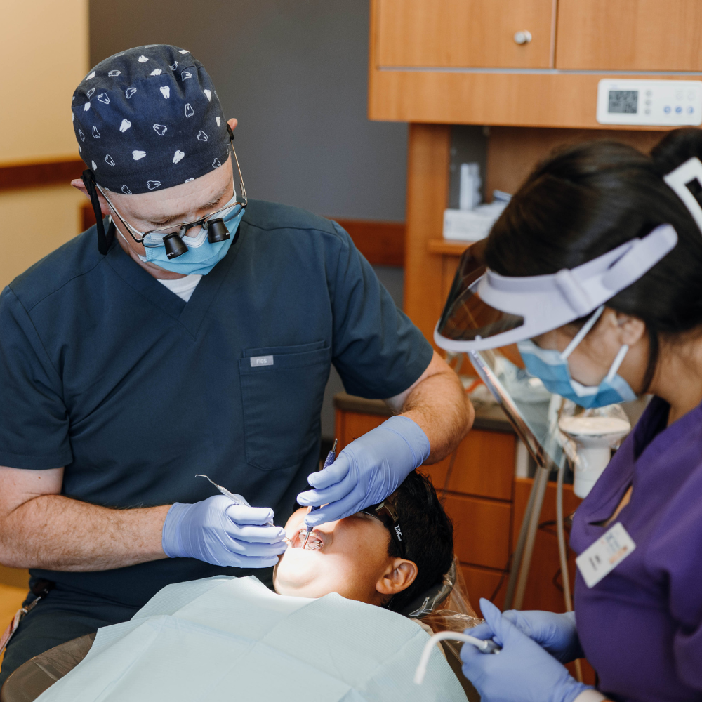 Nurse drawing blood from patient